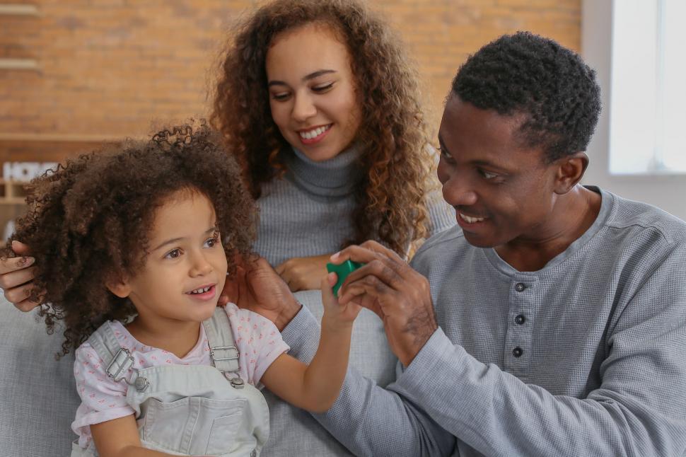 Free Image of Family at home child learning with building blocks 