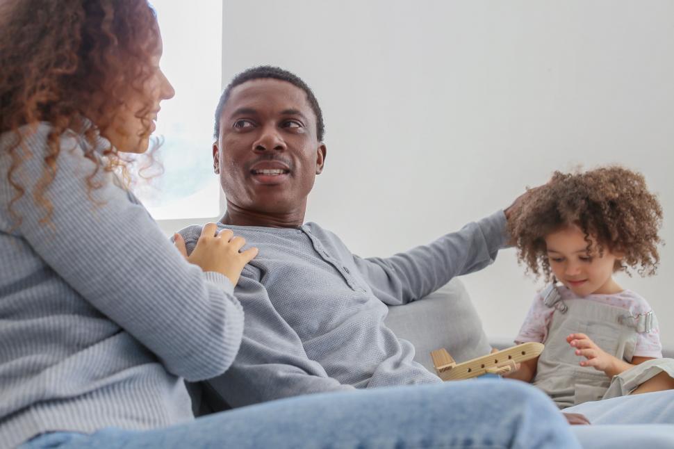 Free Image of Casual family moment with toys 