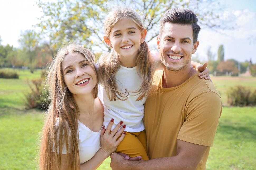 Free Image of Family portrait with happy parents and child 