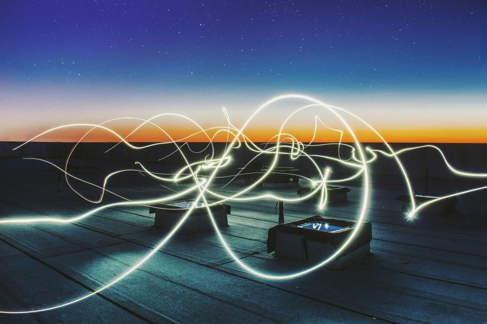 Free Image of Abstract light painting under twilight sky 