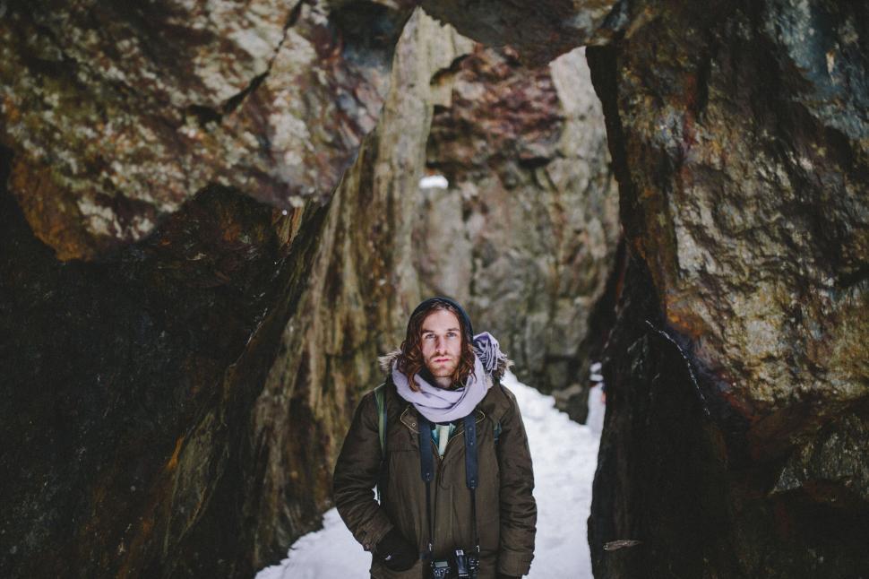 Free Image of Lone hiker in a rugged mountain pass 