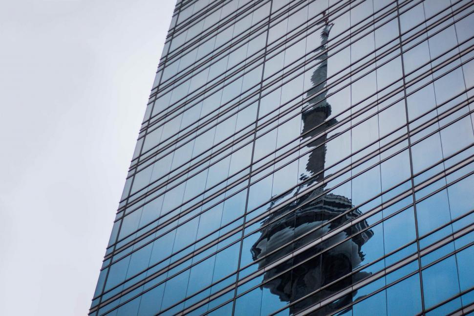 Free Image of Reflected tower on modern building 