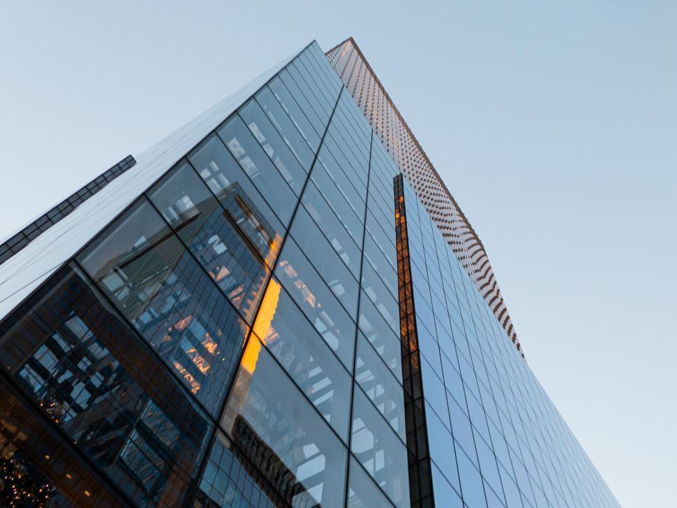 Free Image of Modern skyscraper reaching into blue sky 