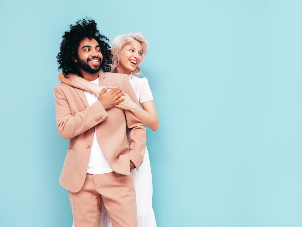 Free Image of A man and woman hugging 