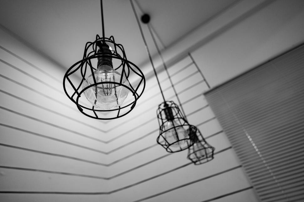 Free Image of Monochrome interior with designer lamps 