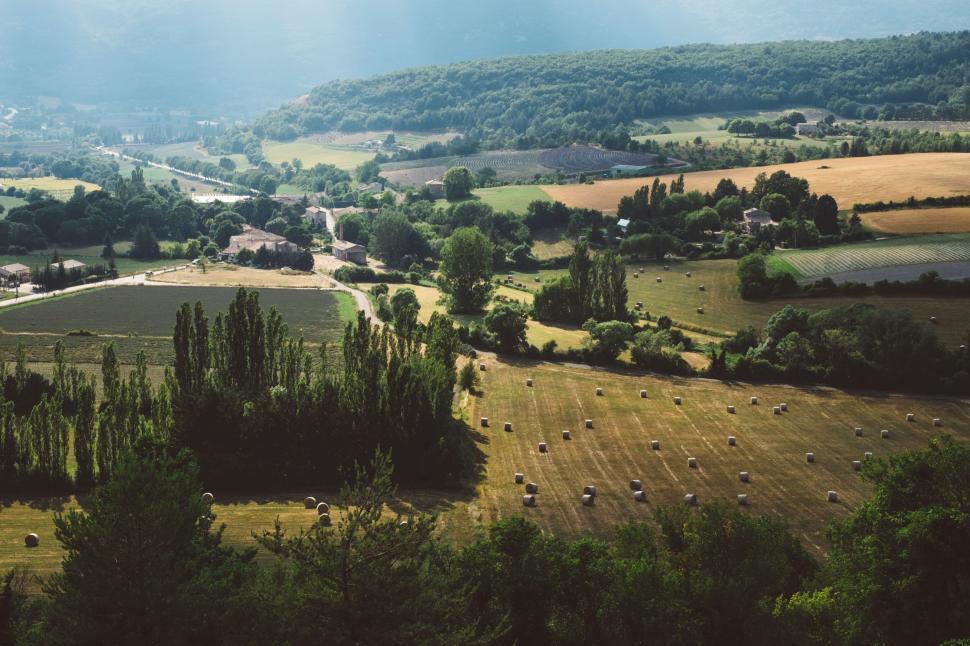 Free Image of Rural landscape with bales of hay 