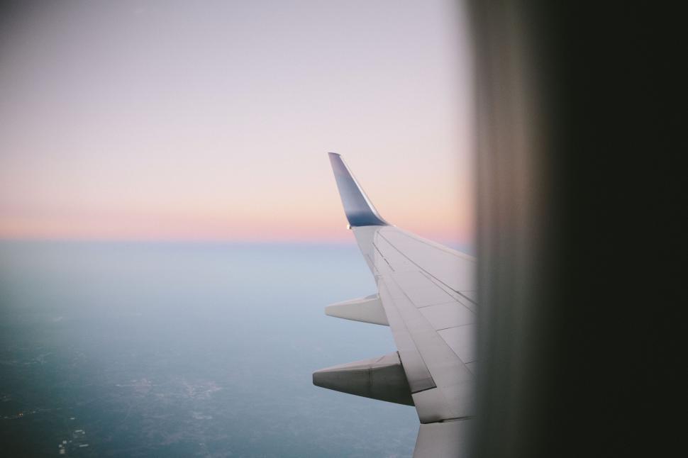 Free Image of Plane wing during a sunset flight 