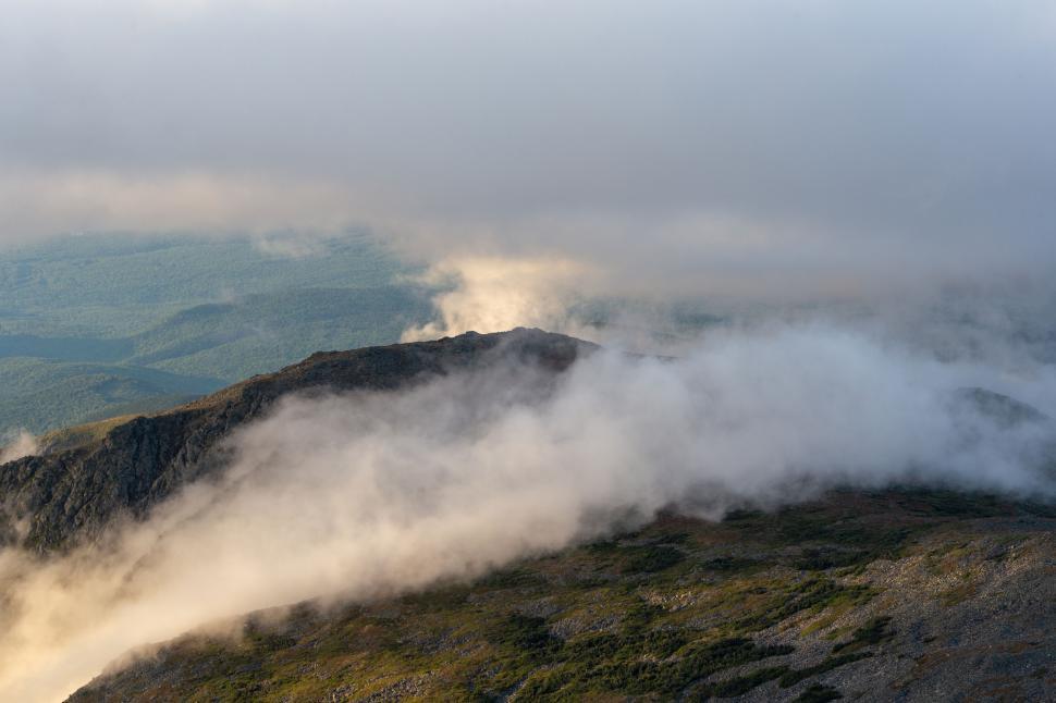 Free Image of Misty mountain peak during sunrise 