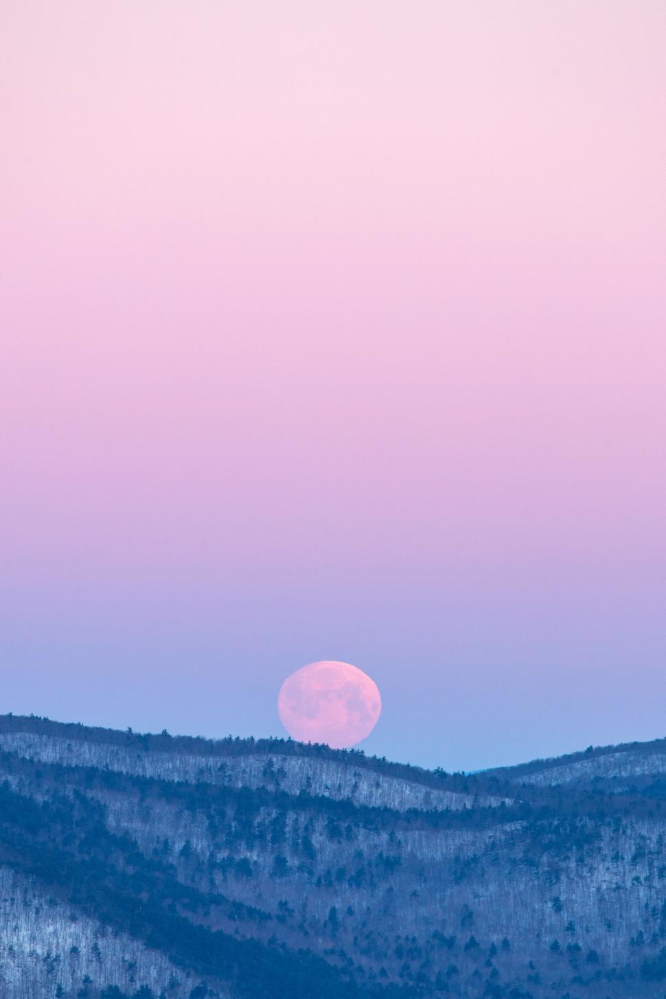 Free Image of Full moon over mountain at twilight 