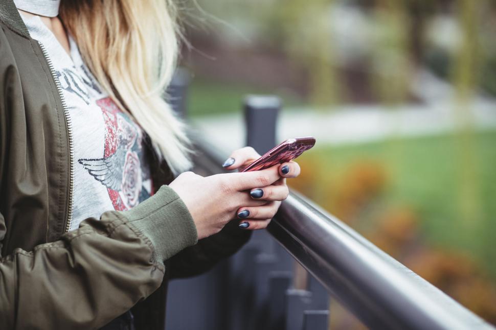 Free Image of Close-up of a woman using a smartphone 