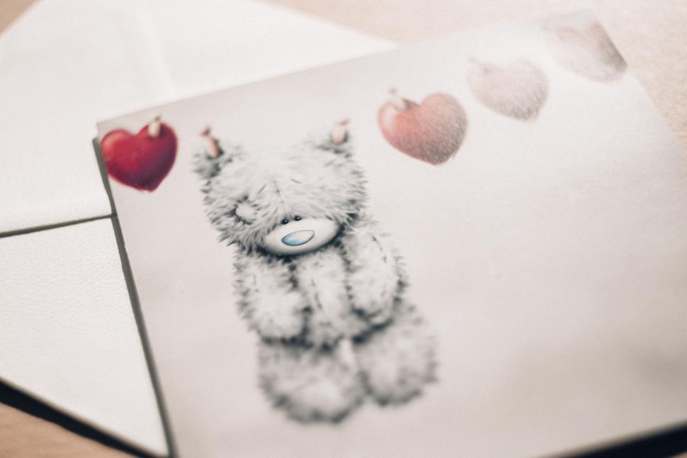 Free Image of Fuzzy plush toy with love hearts 