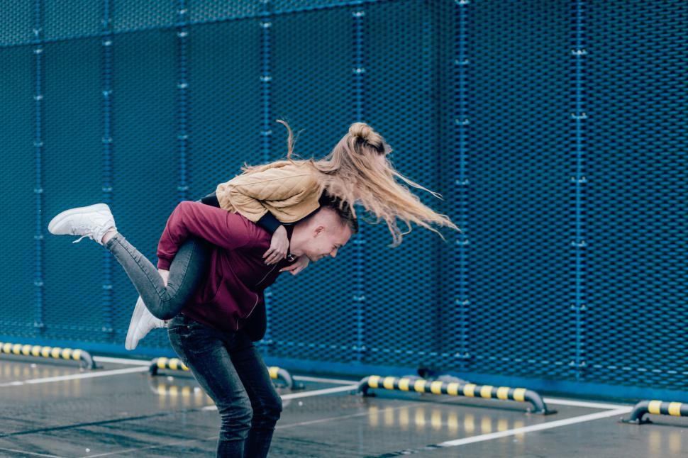 Free Image of Couple performing dynamic dance move 