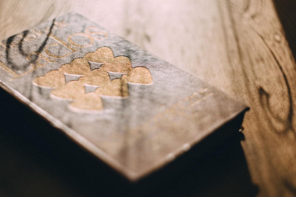 Free Image of Vintage book with cut-out heart shapes 