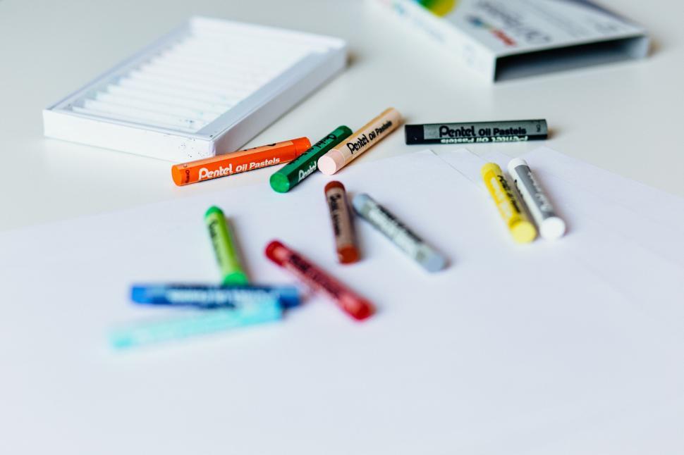 Free Image of Colorful pastel oil pastels on white paper 