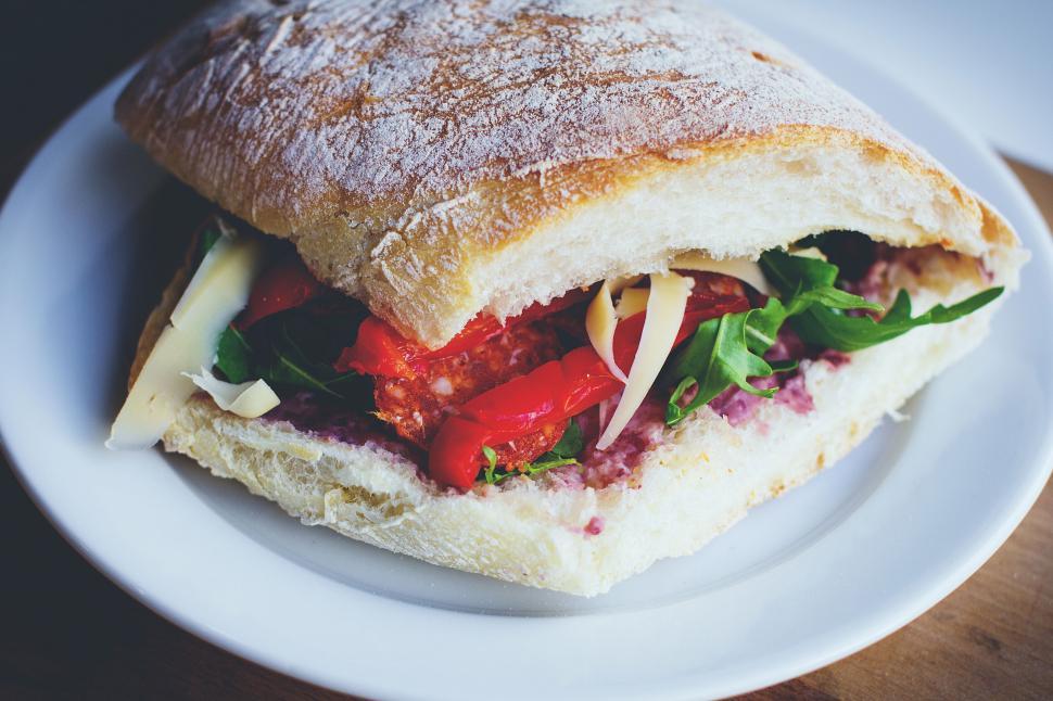 Free Image of Fresh ciabatta sandwich with cheese and arugula 