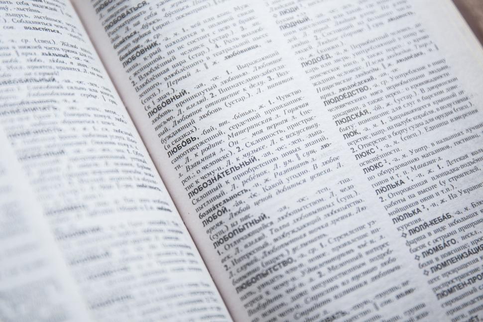 Free Image of Open book showing foreign language text 