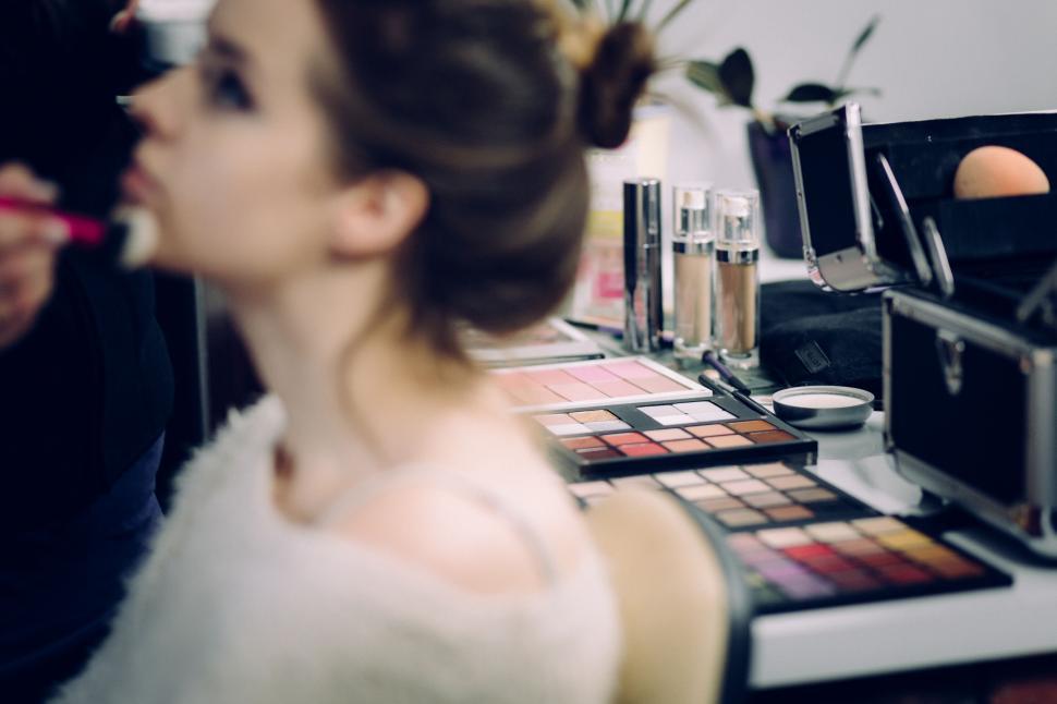 Free Image of Makeup artist working on a client 