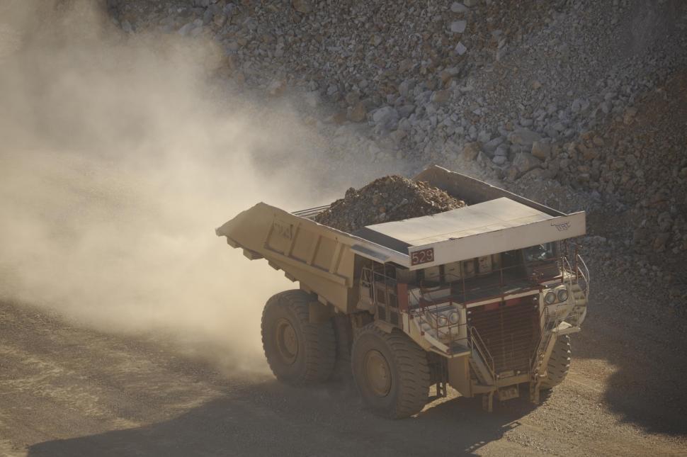 Free Image of Mining dump truck hauling some rocks 