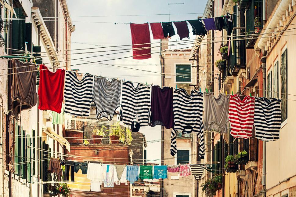 Free Image of Venetian street with hanging laundry lines 