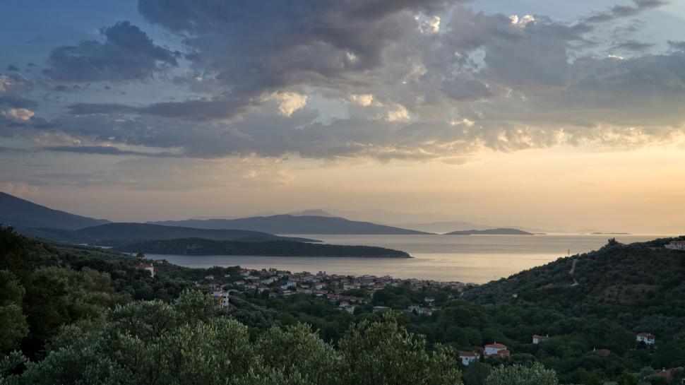 Free Image of Sunset over a Mediterranean coastal town 