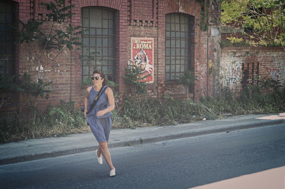 Free Image of Vintage poster on decrepit brick wall 