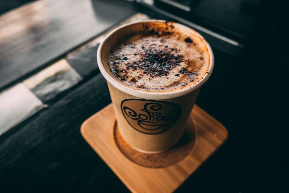 Free Image of Takeaway Coffee Cup with Artistic Design 