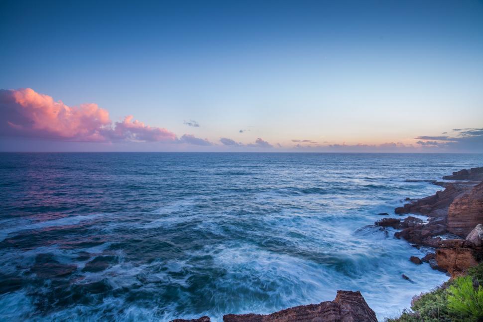 Free Image of Ocean landscape at sunrise with clouds 