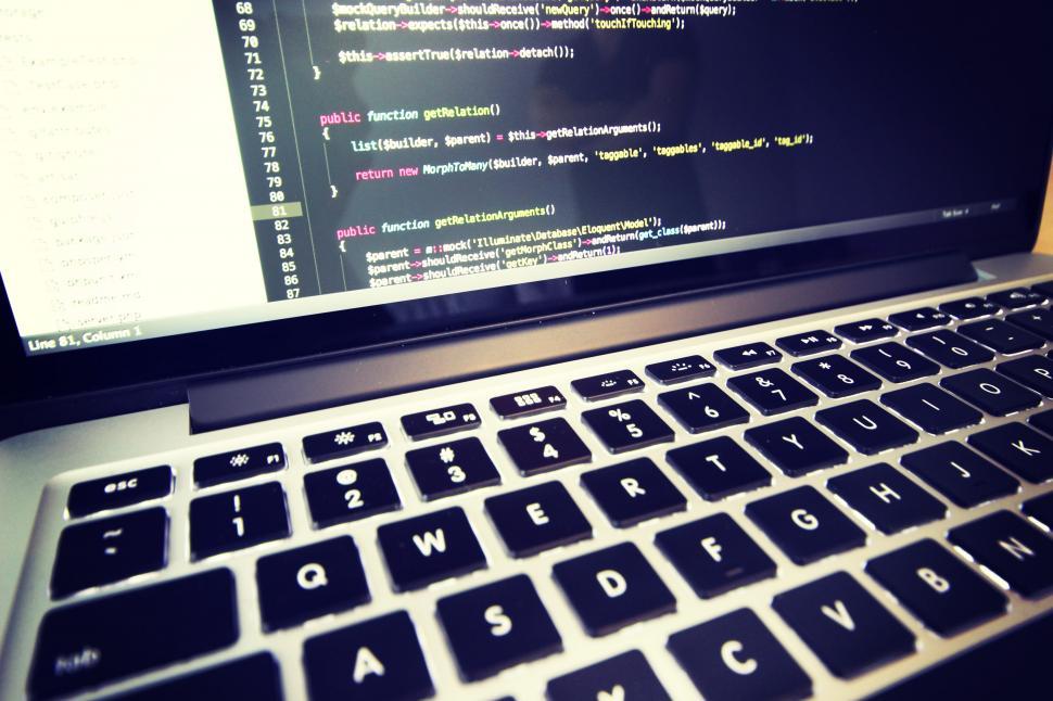 Free Image of Intense coding session on computer with code visible 