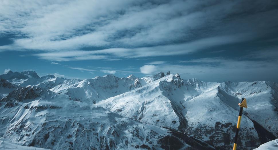 Free Image of Mountain range with a warning sign 