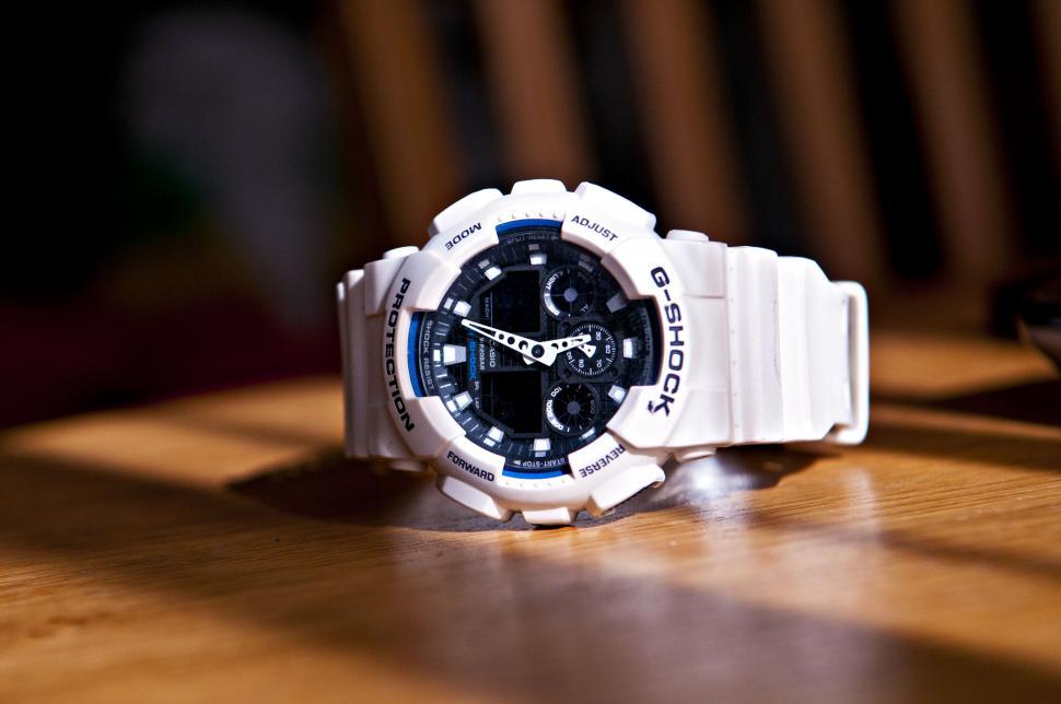 Free Image of White G-Shock wristwatch on a table 