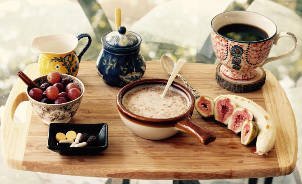 Free Image of Cozy breakfast tray with a variety of foods 