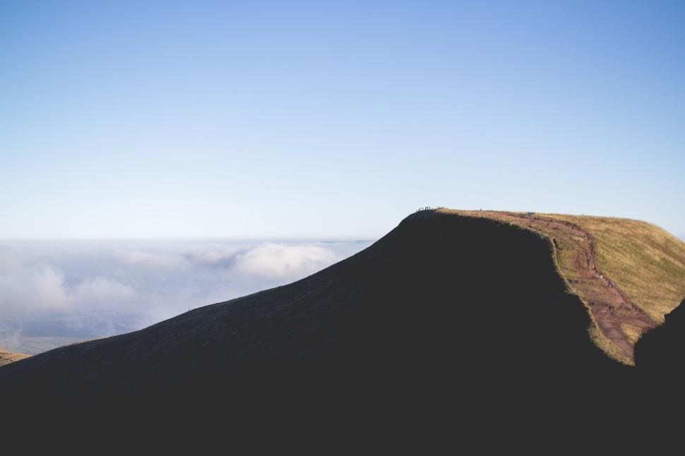 Free Image of Landscape of a hill s silhouette against the sky 