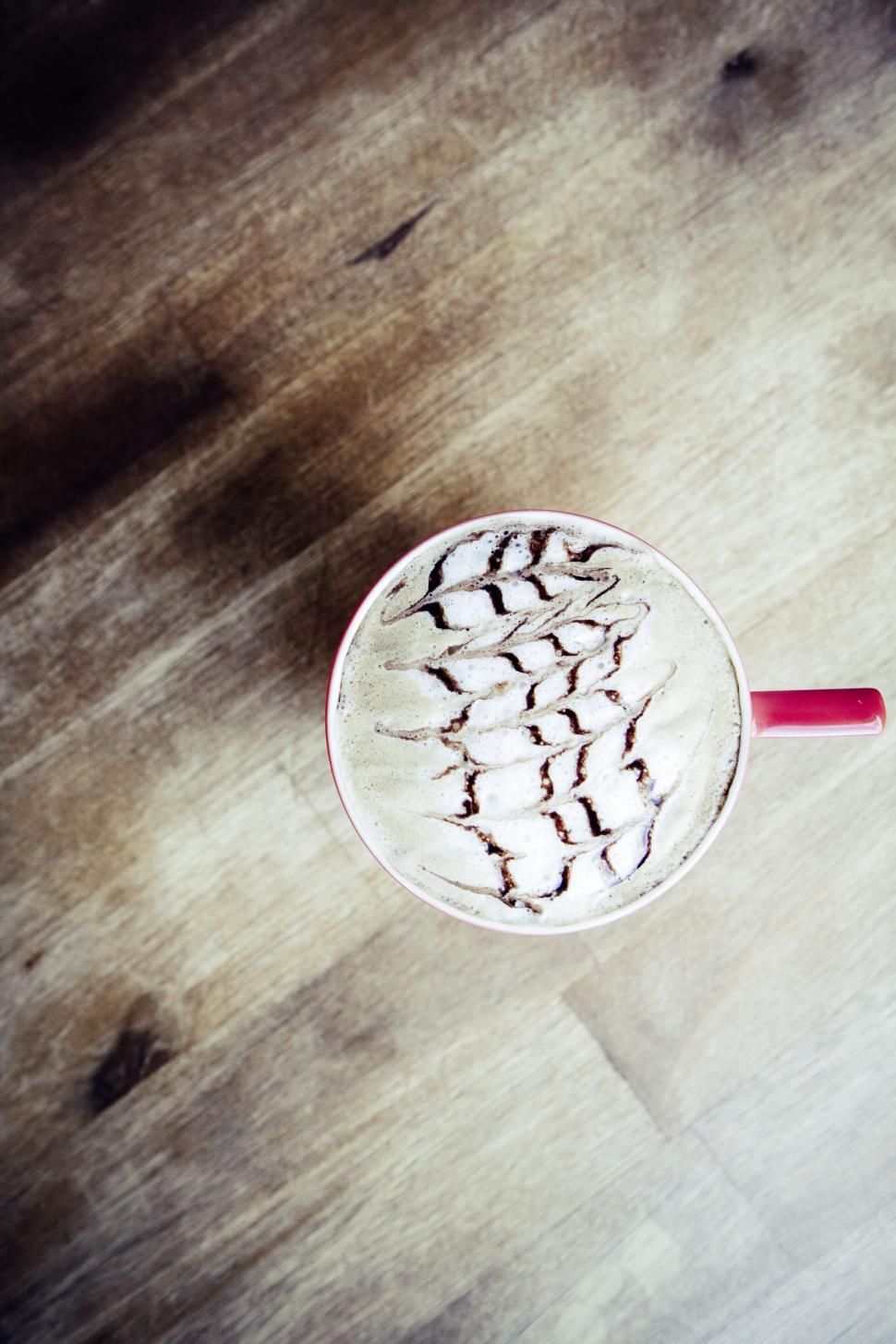 Free Image of Top view of a cappuccino with decorative froth 