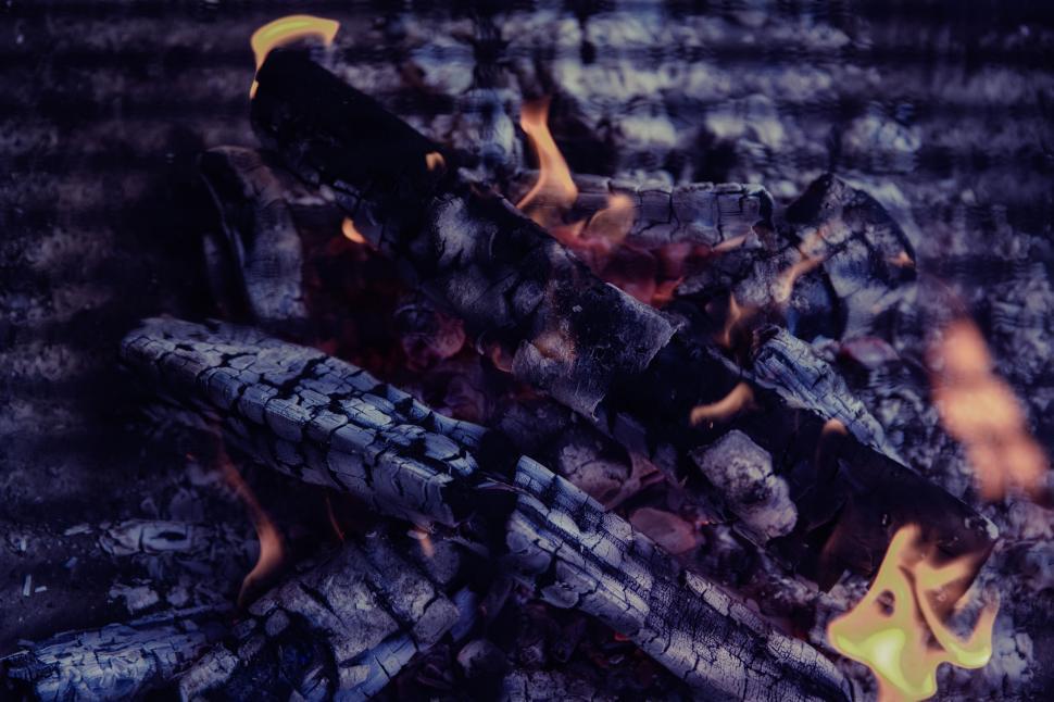 Free Image of Blazing bonfire with wooden logs ablaze 