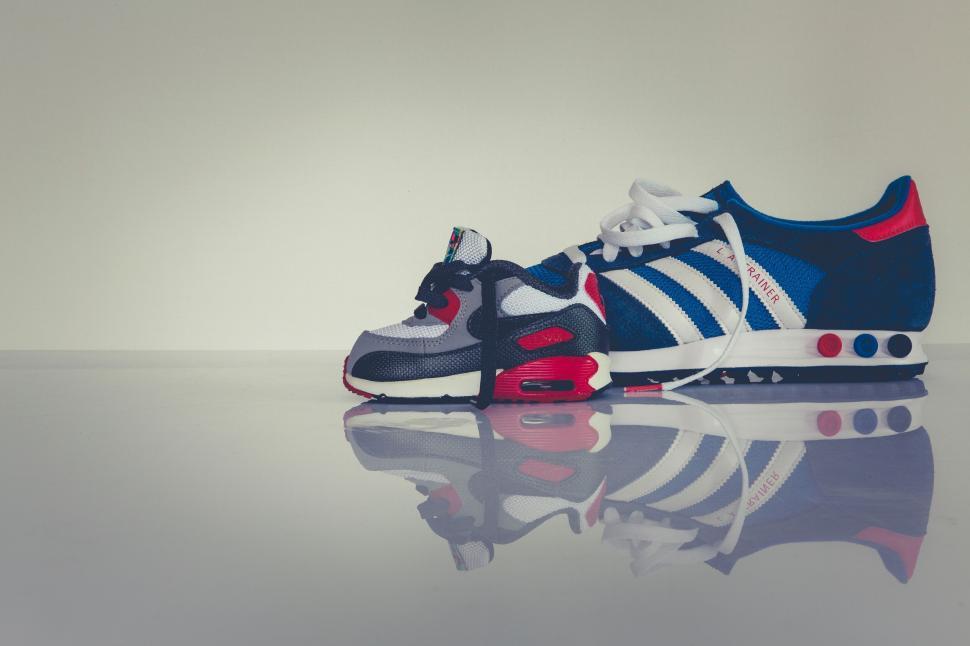 Free Image of Stylish modern sneaker on reflective surface 