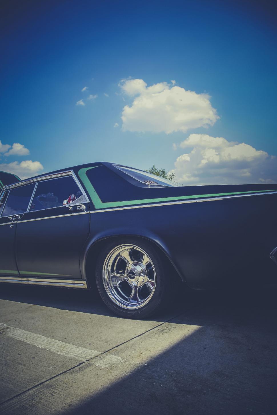 Free Image of Vintage car at an auto show exhibition 