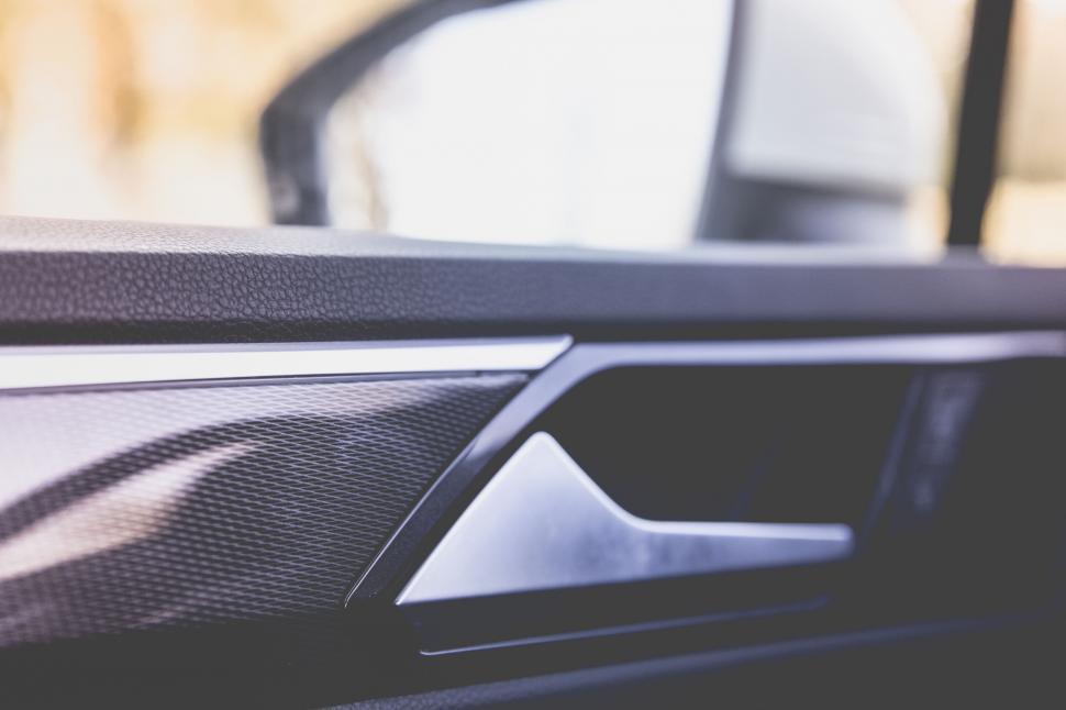 Free Image of Car dashboard with carbon fiber detail and vent 