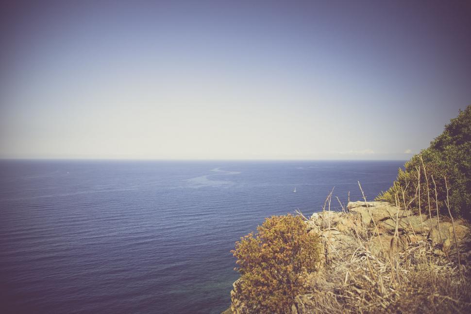 Free Image of Coastline cliff with a serene ocean view 