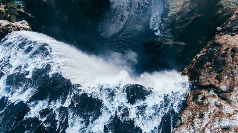 Free Image of Aerial view of a waterfall and rapids 