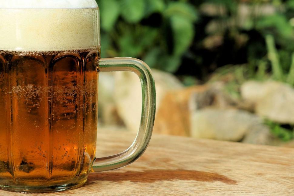 Free Image of Cold beer mug on a wooden table 