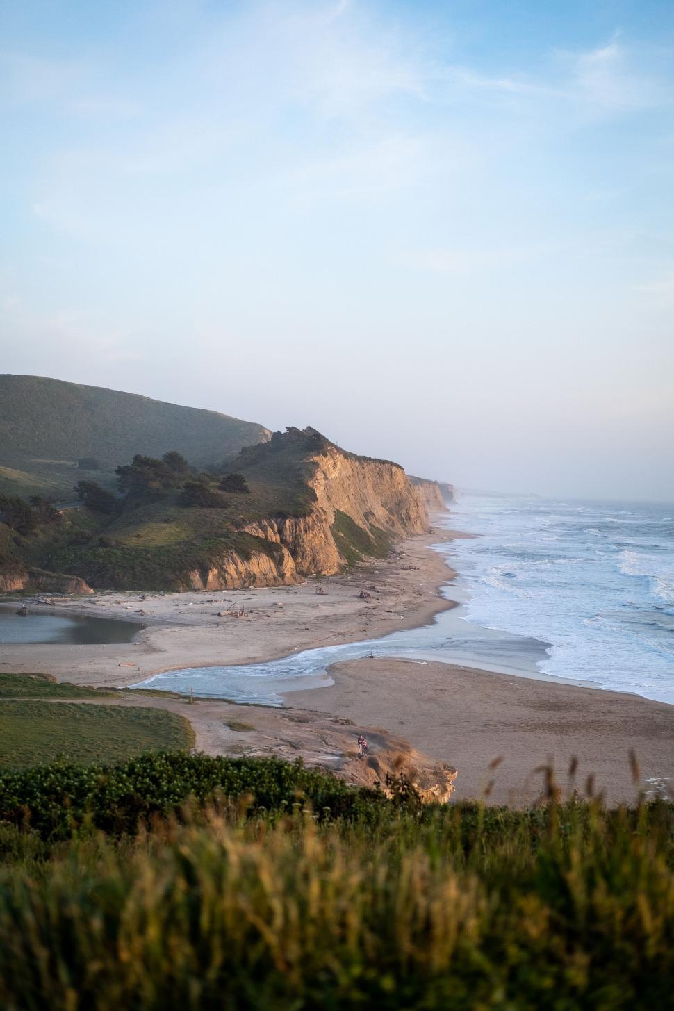 Free Image of Coastal landscape with cliffs and beach 