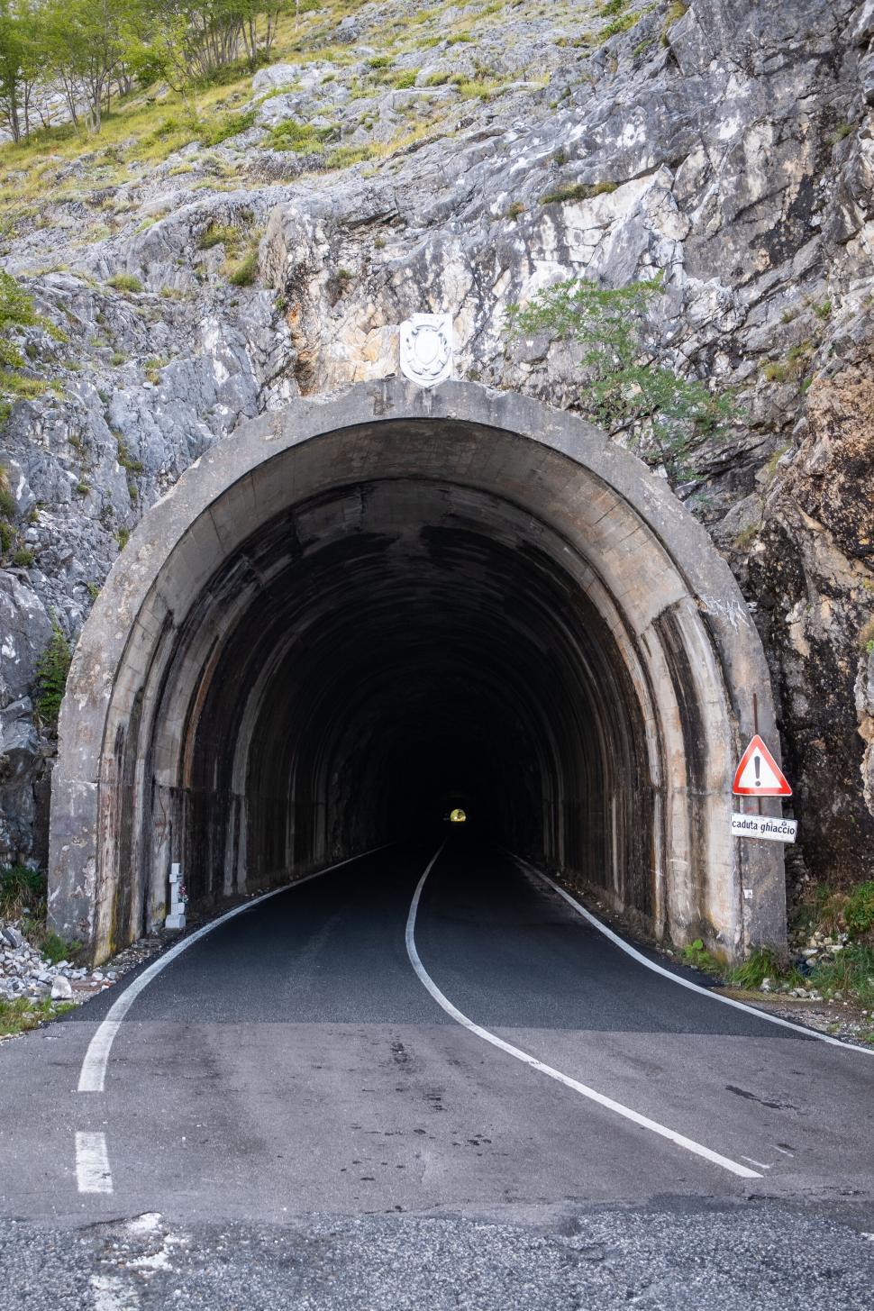 Free Image of Mountain road tunnel entrance in daylight 