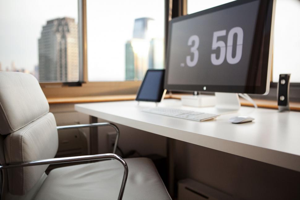Free Image of Modern workstation with city background 