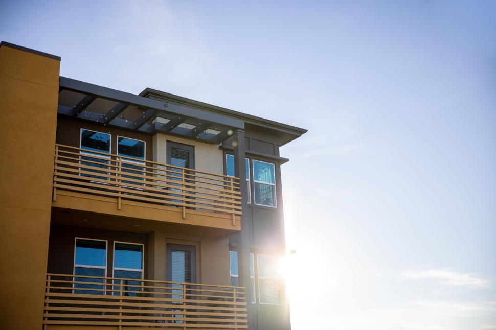 Free Image of Elegant home facade with solar panels at sunset 