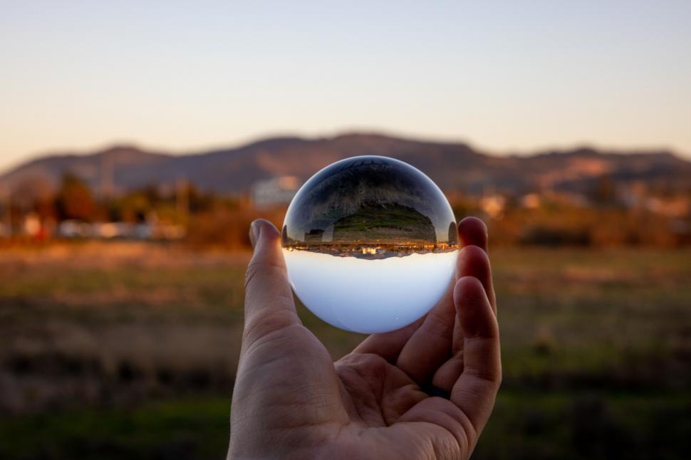 Free Image of Landscape reflected in a crystal sphere 