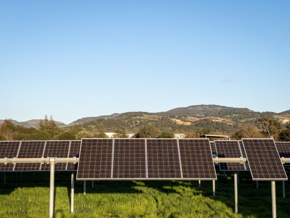 Free Image of Solar panels with scenic mountain background 