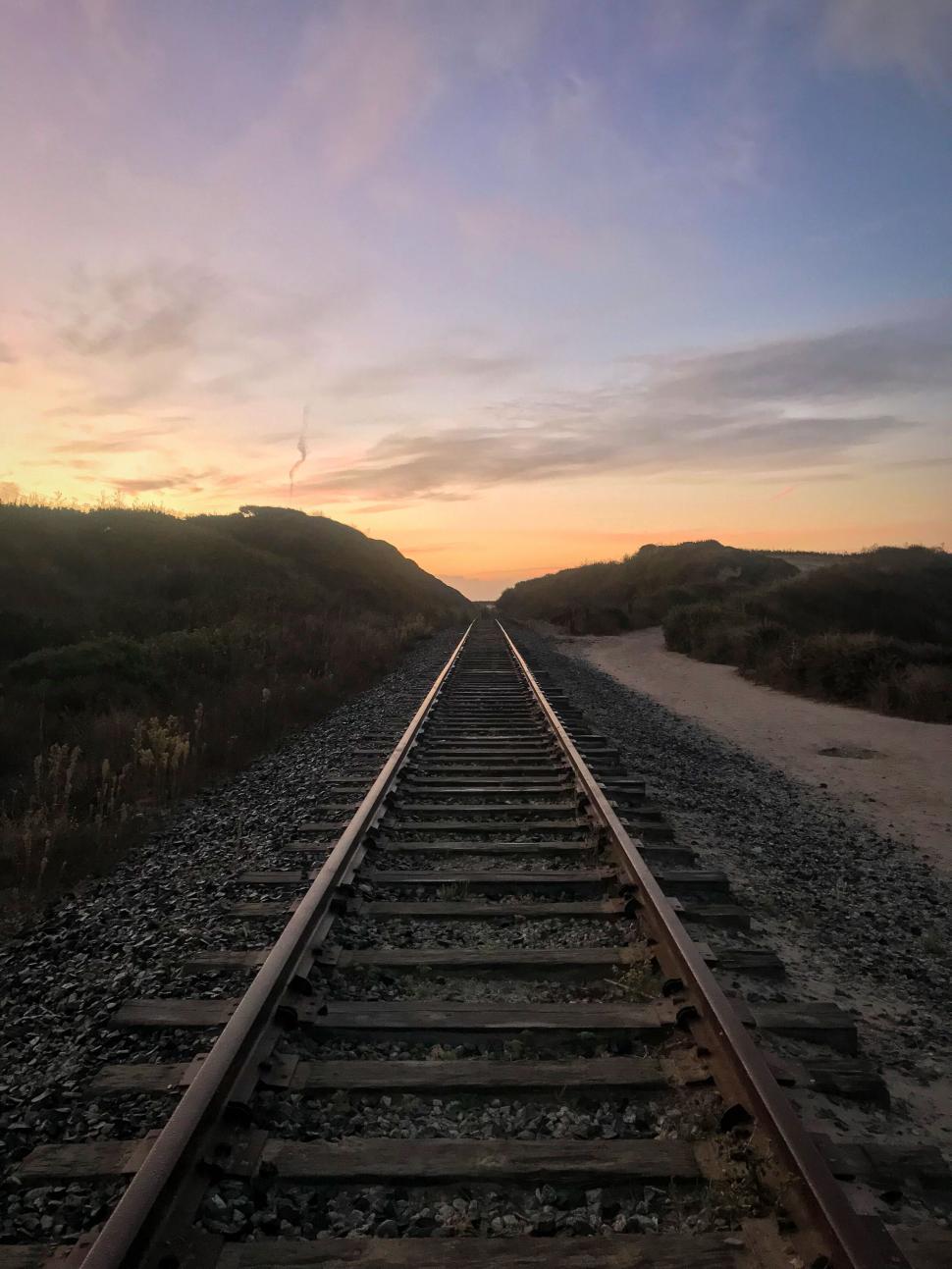 Free Image of Railroad tracks leading into the distance 