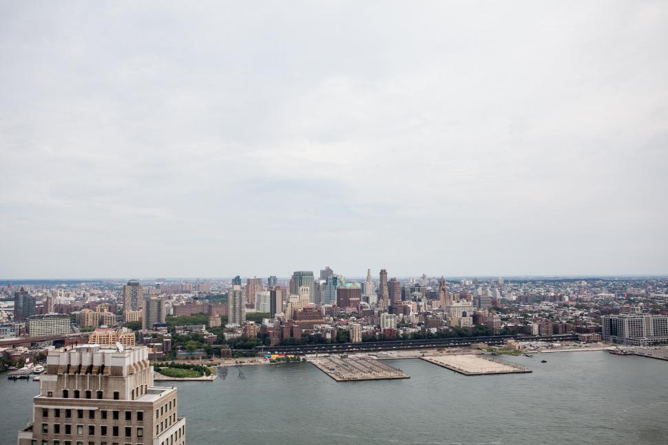 Free Image of Urban landscape with a wide river view 