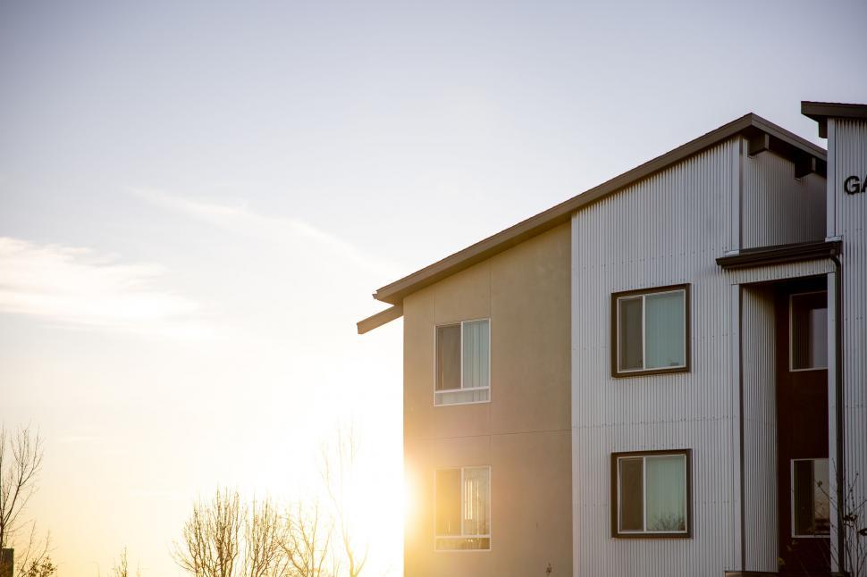 Free Image of Sunset glow on modern residential building 