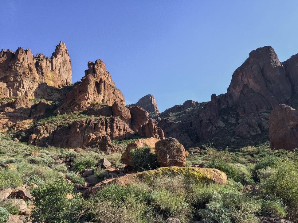 Free Image of Rugged mountain landscape with clear blue sky 